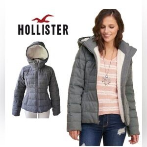 Women’s Hollister gray hooded puffer with Sherpa lining.
Size M, NWOT